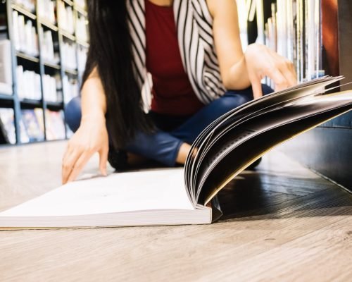 woman-reading-book-floor-min-scaled-1-rax0b320n0546ntcf48amksdwt1w44tii39ql2b1y8
